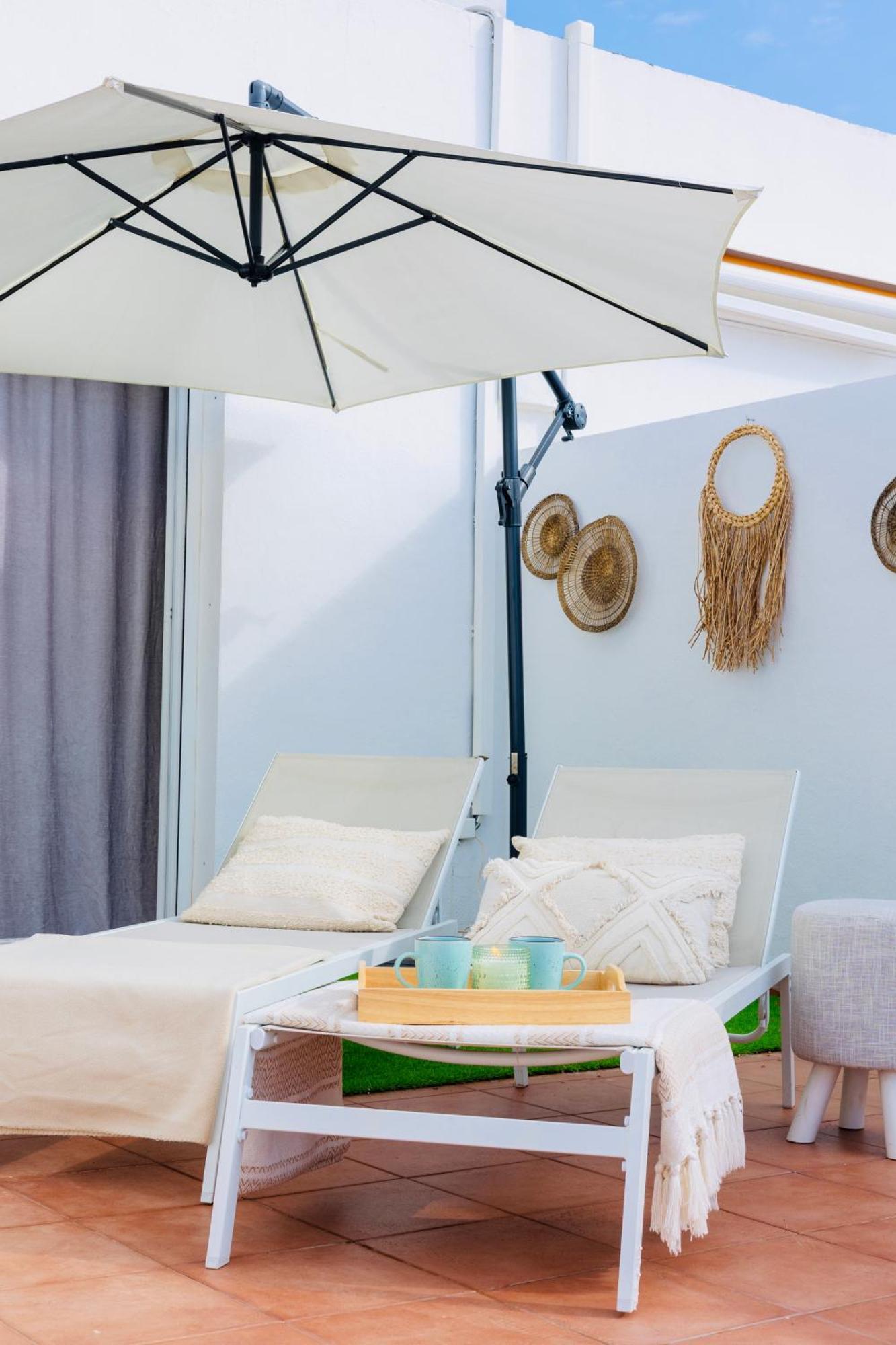 Frente A La Playa Apartamento Boutique En 马尔韦利亚 外观 照片